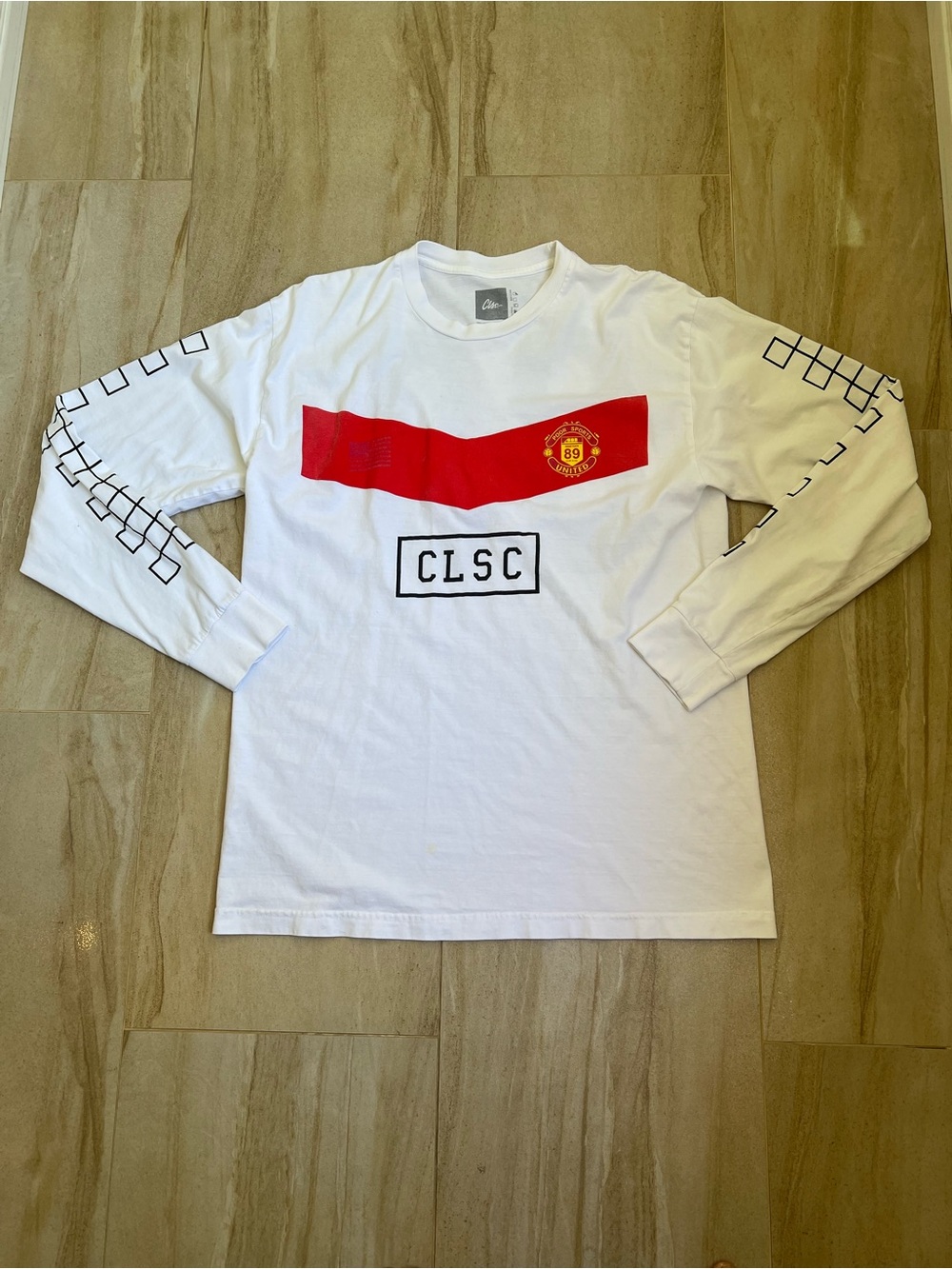 Manchester United White Long-Sleeve Graphic Tee with Red Chest Stripe